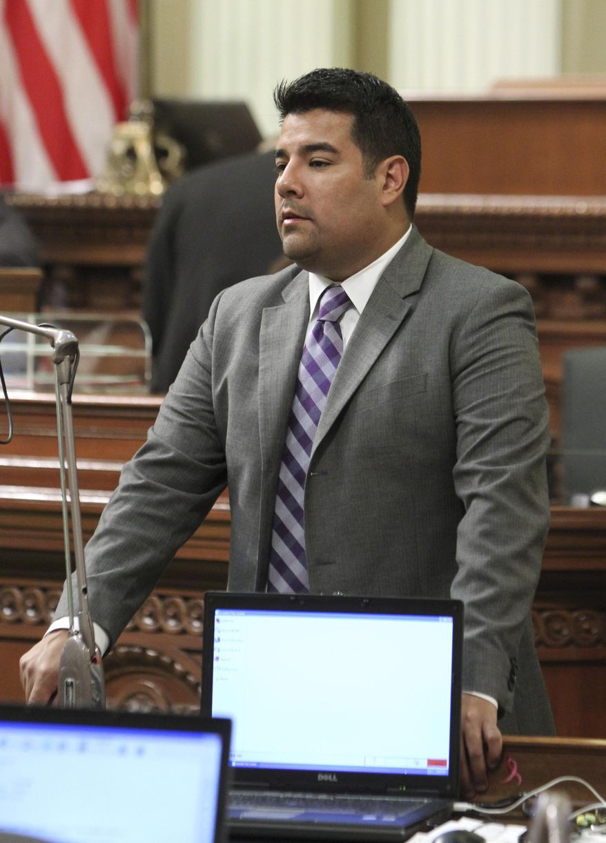FILE - This Aug. 31, 2011 file photo shows Assemblyman Ricardo Lara, D-Bell Gardens at the Capitol in Sacramento, Calif. Immigrants who are in California illegally should have access to health insurance through a state version of the Affordable Care Act, Lara, the head of the Legislature's Latino caucus said Friday Jan. 10, 2014. (AP Photo/Rich Pedroncelli, file)