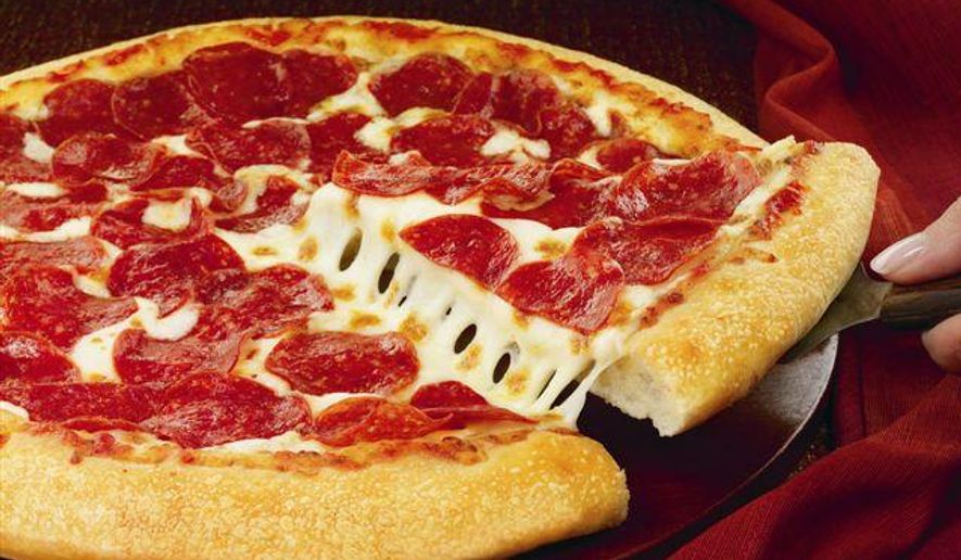 This handout photo provided by Pizza Hut, shows a hand-tossed pizza. (AP Photo/Pizza Hut-HO) ** FILE **