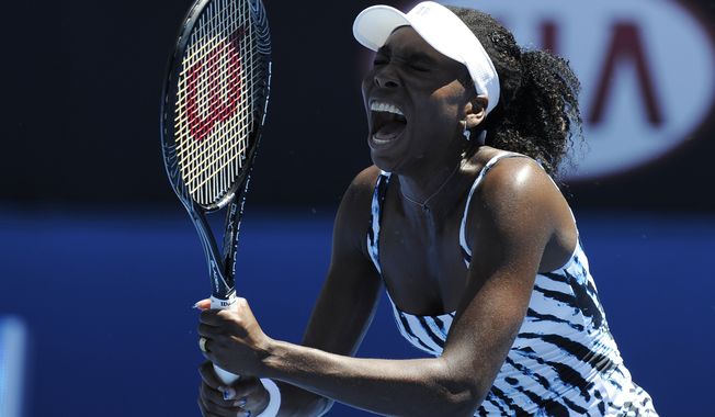 Venus Williams of the U.S.  reacts during her first round match against Ekaterina Makarova of Russia at the Australian Open tennis championship in Melbourne, Australia, Monday, Jan. 13, 2014. (AP Photo/Andrew Brownbill)