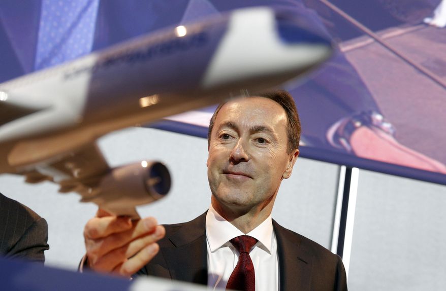 Airbus CEO Fabrice Bregier arrives for the annual news conference in Toulouse, southwestern France, Monday, Jan. 13, 2014. The European aerospace conglomerate said Monday it delivered 626 planes last year, a company record but still 22 fewer than U.S. rival Boeing Co. (AP Photo/Christophe Ena)