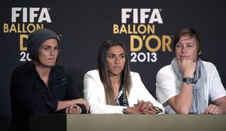 Nadine Angerer of Germany, left, Marta   of Brazil, center, and Abby Wambach of the United, right, nominees for the FIFA Women’s World  Soccer Player of the Year, attend a press conference at the FIFA Ballon d&#39;Or Gala 2013  in Zurich, Switzerland, Monday, Jan.  13, 2014 (AP Photo/Keystone,Walter Bieri)