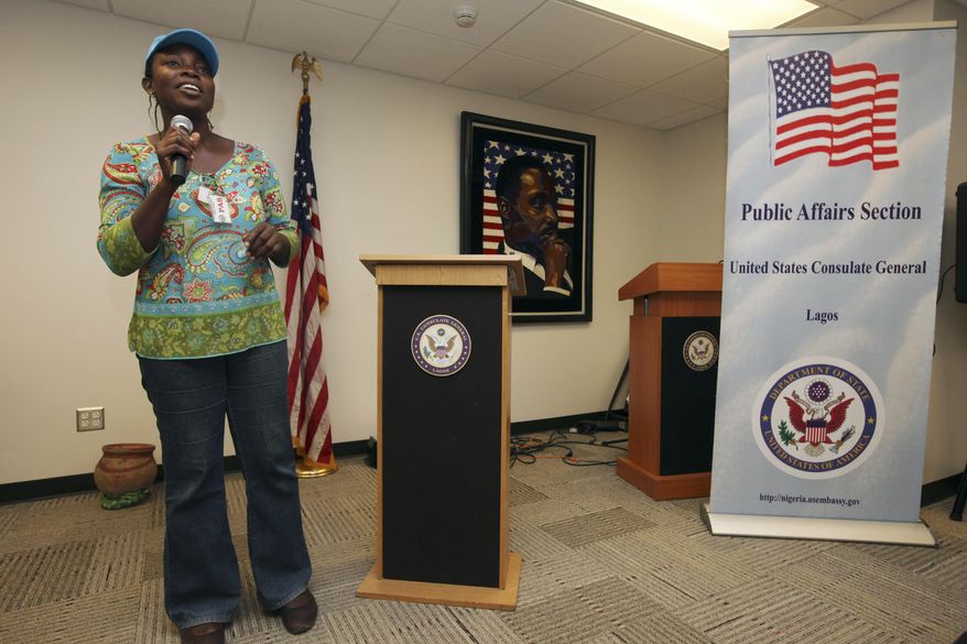 FILE - In this, Friday, Dec. 2, 2011 photo, Abosede Oladayo, 36, an AIDS activist living with HIV, speaks during an event to mark World Aids Day at the U.S Embassy in Lagos, Nigeria. Local and international groups fighting AIDS warned on Tuesday, Jan. 14, 2014, that a new Nigerian law criminalizing same-sex marriage and gay organizations will jeopardize the fight against the deadly disease. The United States, Britain and Canada condemned the law, with Secretary of State John Kerry saying Monday that it 'dangerously restricts freedom' of expression and association of all Nigerians.(AP Photo/Sunday Alamba, File)