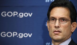 House Majority Leader Eric Cantor of Va., and GOP leaders face reporters, on Capitol Hill in Washington, Tuesday, Jan. 14, 2014, after a weekly House Republican Conference meeting. The Republicans tied the recent stagnant employment reports to the policies of President Barack Obama and Democratic lawmakers.  (AP Photo/J. Scott Applewhite)