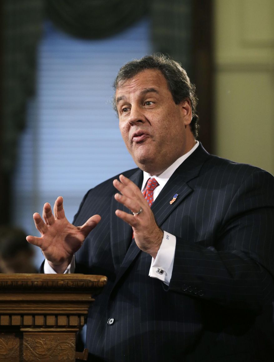 This photo taken Jan. 9, 2014, shows New Jersey Gov. Chris Christie gesturing as he answers a question during a news conference at the Statehouse in Trenton. Christie will propose extending the public school calendar and lengthening the school day in a speech he hopes will help him rebound from an apparent political payback scheme orchestrated by key aides. The early front-runner for the 2016 Republican presidential nomination will make a case Tuesday Jan. 14, 2014, that children who spend more time in school graduate better prepared academically, according to excerpts of his State of the State address obtained by The Associated Press. (AP Photo/Mel Evans)