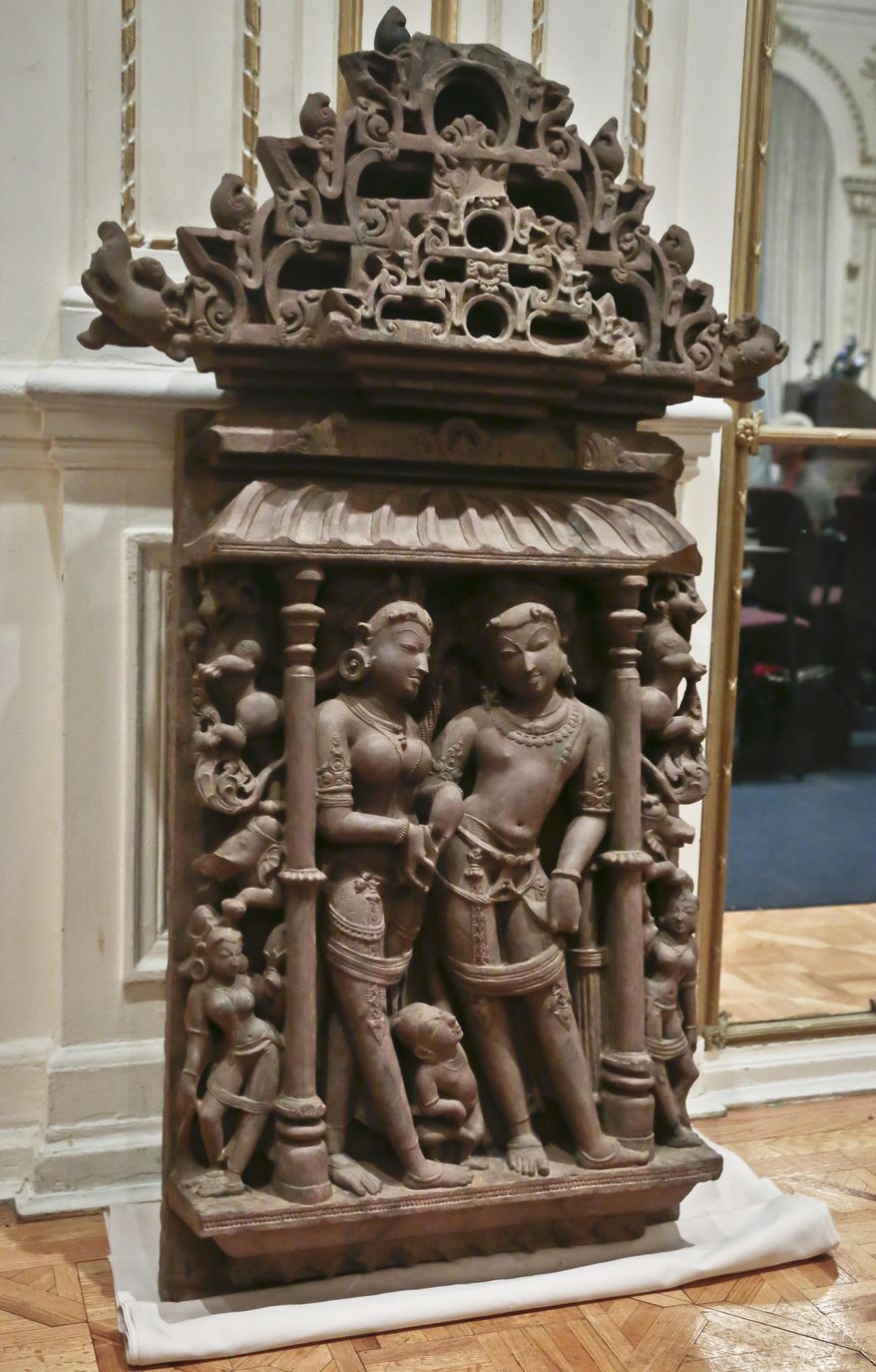A recovered Indian sandstone antiquity is shown during a repatriation ceremony on Tuesday, Jan. 14, 2014 in New York. U.S. authorities returned three stolen antiquities to the Indian government. Homeland Security Investigations agents seized the art, valued at more than $1.5 million. (AP Photo/Bebeto Matthews)
