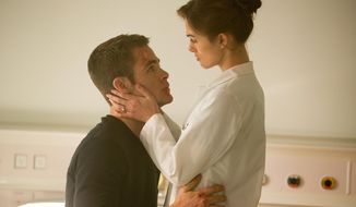 This image released by Paramount Pictures shows Keira Knightley, right, and Chris Pine in &amp;quot;Jack Ryan: Shadow Recruit,&amp;quot; an action thriller about a covert CIA analyst who uncovers a Russian plot to crash the U.S. economy with a terrorist attack. (AP Photo/Paramount Pictures, Larry Horricks)