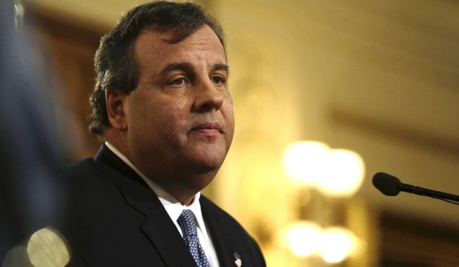 New Jersey Gov. Chris Christie delivers his State Of The State address at the Statehouse, Tuesday, Jan. 14, 2014, in Trenton, N.J. Christie apologized again Tuesday, saying his administration “let down the people we are entrusted to serve” but that it doesn’t define his team or the state. (AP Photo/Julio Cortez)