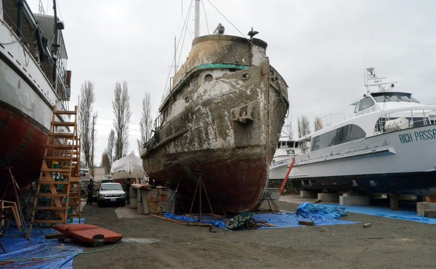 In this Jan. 10, 2014 photo, the Western Flyer, a vessel made famous by author John Steinbeck, sits at a Port Townsend, Wash., boat yard. Salinas, Calif., businessman Gerry Kehoe and owner of the vessel, says he plans to dissemble the derelict and move it to Salinas as a museum and tribute to Steinbeck. (AP Photo/The Peninsula Daily News, Charlie Bermant)