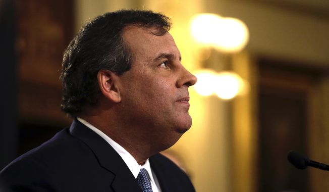 New Jersey Gov. Chris Christie delivers his State Of The State address at the Statehouse, Tuesday, Jan. 14, 2014, in Trenton, N.J. Faced with a widening political scandal that threatens to undermine his second term and a possible 2016 presidential run, Christie apologized again Tuesday, saying his administration "let down the people we are entrusted to serve" but that the issue doesn't define his team or the state. (AP Photo/Julio Cortez)
