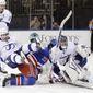 Tampa Bay Lightning&#39;s Tom Pyatt (11) pushes New York Rangers&#39; Brian Boyle (22) into goalie Ben Bishop (30) during the second period of an NHL hockey game, Tuesday, Jan. 14, 2014, in New York. (AP Photo/Frank Franklin II)