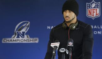 San Francisco 49ers quarterback Colin Kaepernick speaks to reporters at an NFL football training facility in Santa Clara, Calif., Wednesday, Jan. 15, 2014. The 49ers are scheduled to play the Seattle Seahawks for the NFC Championship on Sunday. (AP Photo/Jeff Chiu)