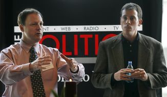John Harris (left), editor in chief of Politico, and Jim VandeHei, executive editor, speak to advertisers in Arlington, Va., on Jan. 19, 2007. (Associated Press)