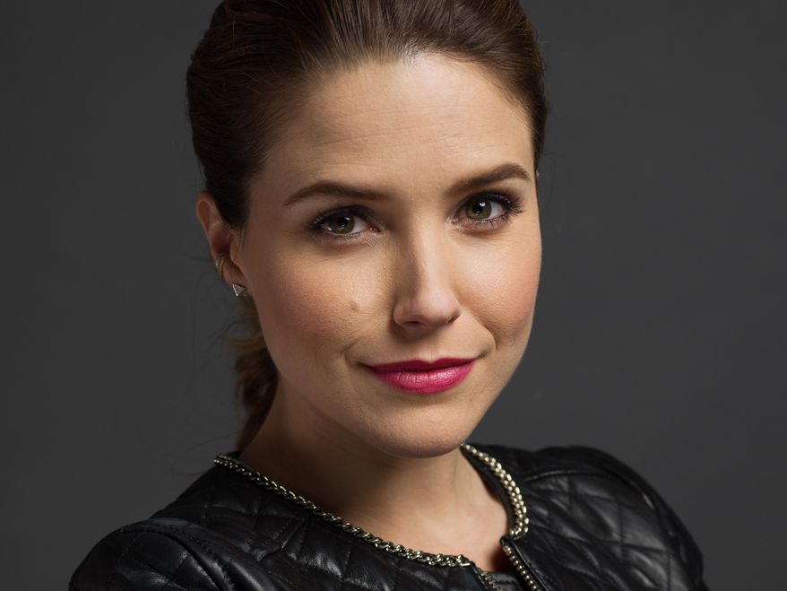 This Jan. 8, 2014 photo shows American actress Sophia Bush poses during a portrait session to promote her series "Chicago P.D.," in New York. The series airs Wednesdays at 10 p.m. on NBC. (Photo by Scott Gries/Invision/AP)