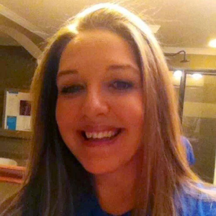 File - This 2013 file photo provided by the Hunt family shows Kari Hunt Dunn. Hunt’s 9-year-old daughter tried to call 911 from the hotel room where she could hear her mother dying but didn’t know to dial 9 first. Federal Communication Commission Commissioner Ajit Pai is asking the nation’s largest hotel chains whether they require guests to dial 9 before 911. (AP Photo/Courtesy of the Hunt family, file)