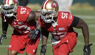 San Francisco 49ers linebacker NaVorro Bowman (53) and linebacker Patrick Willis (52) practice at an NFL football training facility in Santa Clara, Calif., Wednesday, Jan. 15, 2014. The 49ers are scheduled to play the Seattle Seahawks for the NFC Championship on Sunday. (AP Photo/Jeff Chiu)