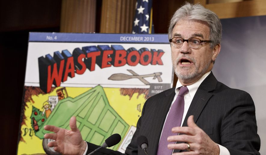 In this Dec. 17, 2013 file photo, Sen. Tom Coburn, R-Okla., a longtime deficit hawk, outlines his annual &quot;Wastebook&quot; which points a critical finger at billions of dollars in questionable government spending during a news conference on Capitol Hill in Washington. On March 28, 2020, Mr. Coburn's family released a statement noting the former senator has passed away. (AP Photo/J. Scott Applewhite, File)