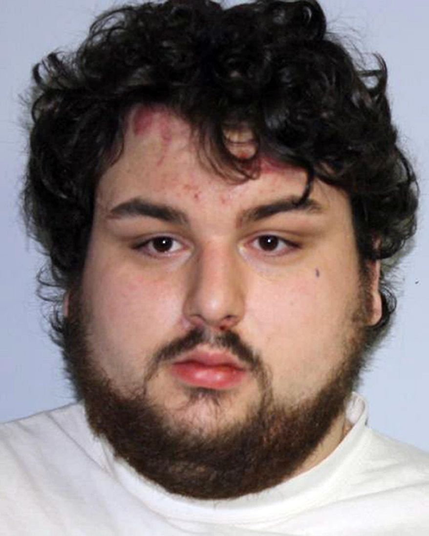 In this undated booking photo released by St. Louis County, Minn., Sheriff’s Office, Shawn R. Doherty, 24, is seen. The Babbitt man accused of killing his mother's boyfriend told her he thought the man was coming between them, according to court documents. Doherty is charged with one count of second-degree intentional murder in the strangulation death of John P. Bulen, 55, of Mahtomedi. (AP Photo/St. Louis County Sheriff’s Office)