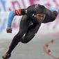 Shani Davis of the United states skates in the men&#39;s 1,000 meters race at the World Sprint Speed Skating Championships in Nagano, central Japan, Saturday, Jan. 18, 2014. (AP Photo/Koji Sasahara)