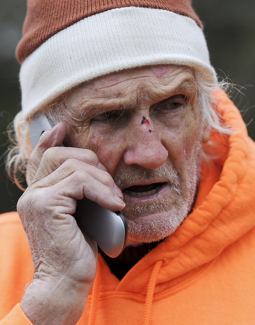 Peter Gregory, 85, talks with someone looking for a home for a horse, Wednesday, Jan. 8, 2014 at his Mill Creek Farm in Alachua, Fla., where he and his wife Mary care for abused and neglected horses. About 130 horses have this 325-acre farm as their retirement home, doted on by the Gregorys, who promise each horse who arrives at the farm that it will never be worked or ridden again. Nearly all of the horses have worked for years in law enforcement, military or other service jobs; a few have been seized by police. (AP Photo/Phil Sandlin)