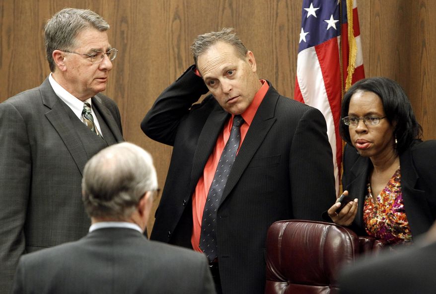 FILE - In this file photo from Jan. 6, 2012, Sen. Leah Landrum Taylor, D-Phoenix, far right, is seen in Phoenix. African-American leaders in Arizona fear their political presence is fading. The impending retirement of Taylor could leave Arizona as one of a handful of states with no African-Americans in the Legislature. She marked the start of her final year in office on Tuesday, Jan. 21, 2014. Also pictured is Arizona Senate President-elect Steve Pierce, R-Prescott, front left, Senate Ethics Committee members Sen. Steve Yarbrough, R-Chandler, top left, Sen. Andy Biggs, R-Gilbert, middle, and Landrum Taylor. (AP Photo/Ross D. Franklin, file)