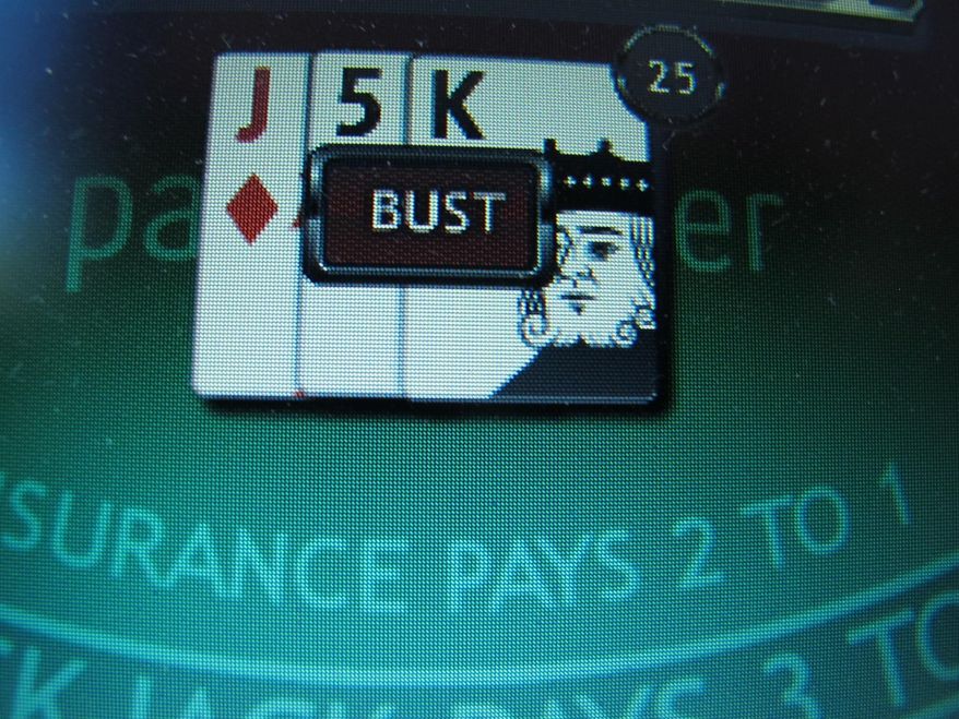 A losing game of Internet blackjack on a computer screen in Atlantic City, N.J. (AP Photo/Wayne Parry)