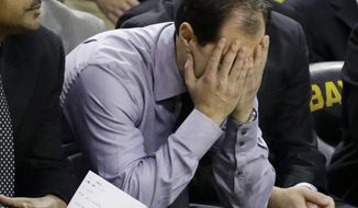 Baylor head coach Scott Drew reacts on the bench in the final minute of an NCAA college basketball game against Oklahoma Saturday, Jan. 18, 2014, in Waco, Texas. Oklahoma won 66-64. (AP Photo/LM Otero)