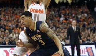 Pittsburgh’s Cameron Wright (3) drives past Syracuse’s Tyler Ennis during the first half of an NCAA college basketball game in Syracuse, N.Y., Saturday, Jan. 18, 2014. (AP Photo/Nick Lisi)