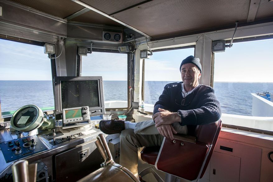 Captain Robert Vance is photographed on the Cape May-Lewes Ferry on Jan. 8, 2014 near Cape May, N.J. Vance has been with the Cape May-Lewes Ferry for thirty years. For a half-century, the ferry has beaten “driving around” virtually every day, stopping only for ice, hurricanes and an employee strike back in 1964. Going into its 50th year of operation, the ferry is up against declining ridership, but Heath Gehrke, director of ferry operations for the Delaware River and Bay Authority, hopes to bring back the excitement. (AP Photo/The Daily Times, Joe Lamberti) NO SALES