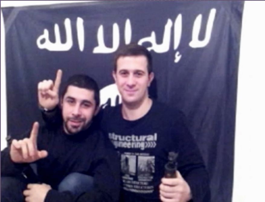 In this image made from a video posted online by an Islamic militant group asserting responsibility for suicide bombings last month that killed 34 people in Volgograd, Russia, two men, identified as Suleiman and Abdurakhman and who purportedly carried out the twin suicide bombings are seen at an unknown location. The two Russian-speaking men featured in the video are identified as members of Ansar al-Sunna, the name of a militant group operating in Iraq. It was unclear whether they had received funding or training from the group or only adopted its name. (AP Photo)