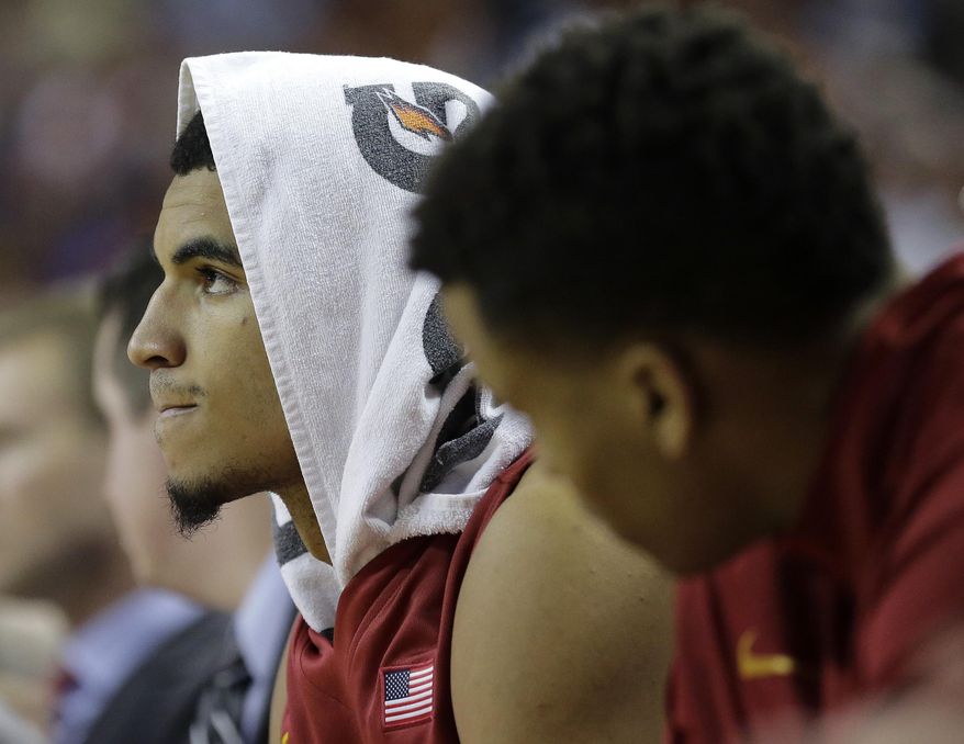 Iowa State's Georges Niang sits on the bench during the second half on an NCAA college basketball game against Texas, Saturday, Jan. 18, 2014, in Austin, Texas. Texas won 86-76. (AP Photo/Eric Gay)