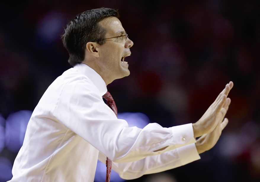 Nebraska coach Tim Miles calls instructions in the first half of an NCAA college basketball game against Ohio State in Lincoln, Neb., Monday, Jan. 20, 2014. (AP Photo/Nati Harnik)