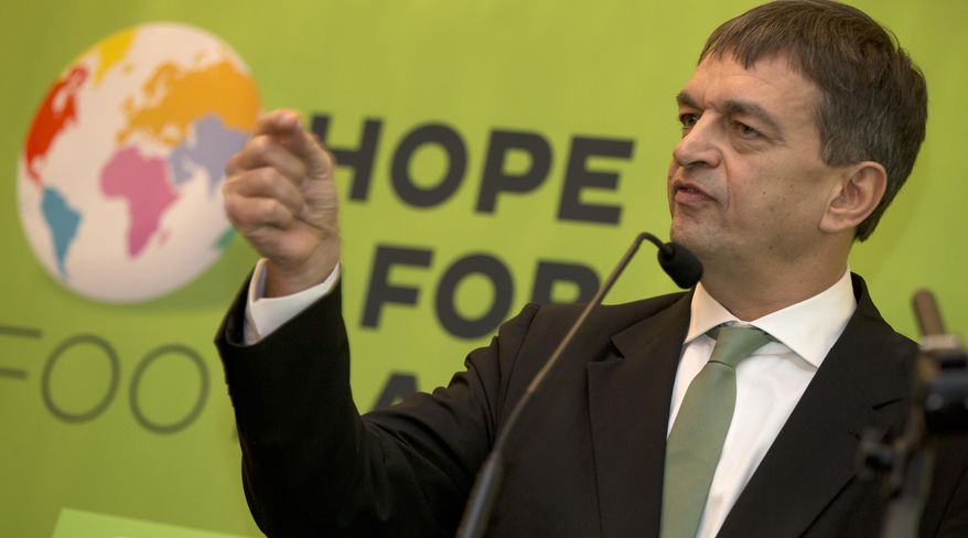 Jerome Champagne speaking to the media in London as he announces his intention to stand for FIFA president in 2015, Monday, Jan 20 2014. Champagne, a Frenchman who is a former current president Sepp Blatter adviser, on Monday became the first person to declare his candidacy for football's top job, saying he will seek the five required nominations. "We need a different FIFA, more democratic, more respected, which behaves better and which does more," said Champagne, a former diplomat who unexpectedly left FIFA in 2010 after 11-years of service. (AP Photo/Alastair Grant)