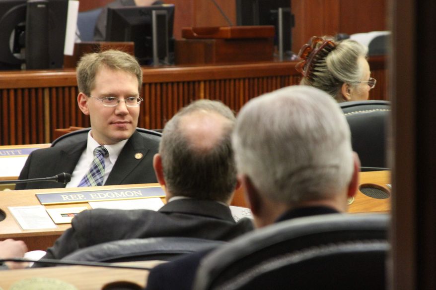 House Maj. Leader Lance Pruitt, R-Anchorage, surveys the chamber during a recess of the opening session of the Alaska House of Representatives in Juneau, Alaska, on Tuesday, Jan. 21, 2014. (AP Photo/Mark Thiessen)