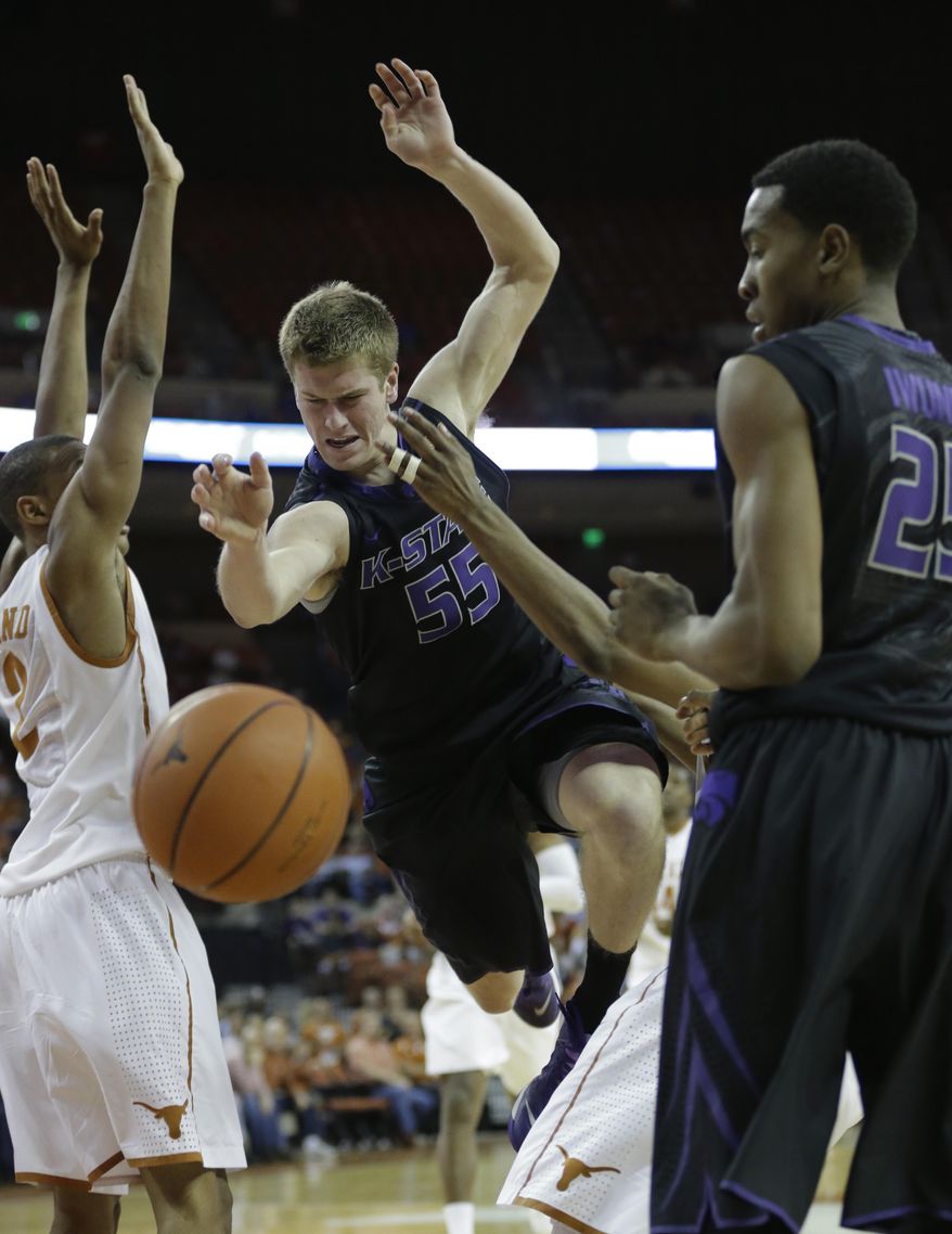 Kansas State's Will Spradling (55) loses control of the ball during the second half of a NCAA college basketball game against Texas, Tuesday, Jan. 21, 2014, in Austin, Texas. Texas won 67-64. (AP Photo/Eric Gay)