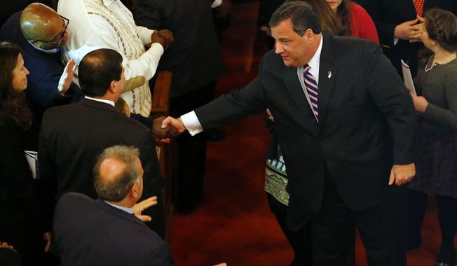 New Jersey Gov. Chris Christie shakes hands as he leaves a prayer service in celebration of his inauguration at the New Hope Baptist Church on Tuesday, Jan. 21, 2014 in Newark.  The celebrations to mark the start of Christie's second term could be tempered by investigations into traffic tie-ups that appear to have been ordered by his staff for political retribution and an allegation that his administration linked Superstorm Sandy aid to approval for a real estate project.  (AP Photo/Rich Schultz)