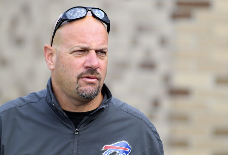 FILE - In this July 31, 2013, file photo, Buffalo Bills defensive coordinator Mike Pettine walks to the field during NFL football training camp in Pittsford, N.Y. Pettine has interviewed for the Cleveland Browns head coaching position, a person familiar with the Browns' plans told the Associated Press. Pettine interviewed with owner Jimmy Haslam and CEO Joe Banner last week and will have his second meeting on Tuesday night, Jan. 21, 2014, in Mobile, Ala., said the person who spoke on condition of anonymity because the team is not commenting during its search. Pettine is at the Senior Bowl in Mobile with other members of Buffalo's staff. (AP Photo/Bill Wippert, File)