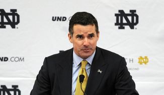Kevin Plank, CEO and founder of Under Armour, speaks during a news conference Tuesday, Jan. 21, 2014, in South Bend, Ind., announcing an agreement between Notre Dame and Under Armour that will outfit the university&#39;s athletic teams. (AP Photo/Joe Raymond) ** FILE **