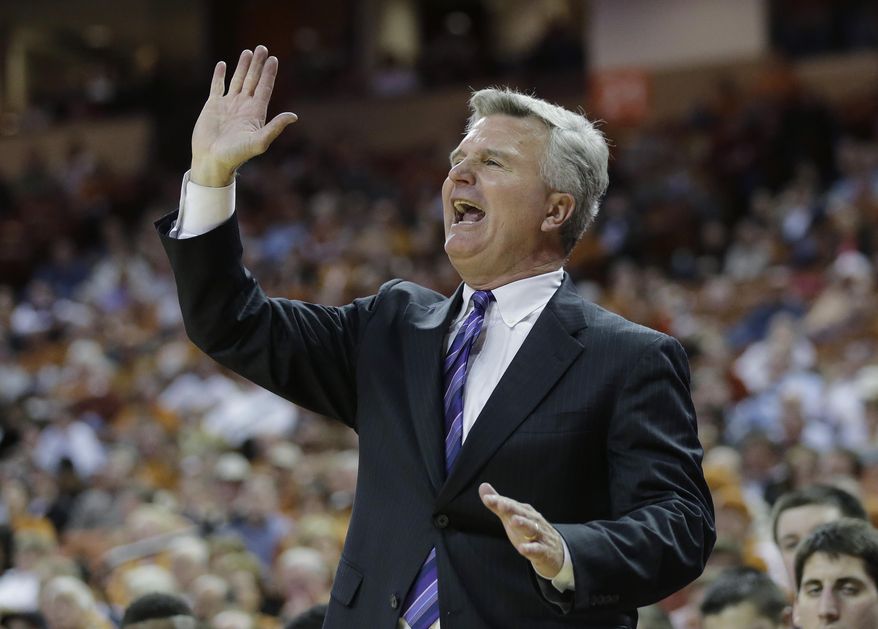 Kansas State coach Bruce Weber talks to his players during the second half of a NCAA college basketball game against Texas, Tuesday, Jan. 21, 2014, in Austin, Texas. Texas won 67-64. (AP Photo/Eric Gay)