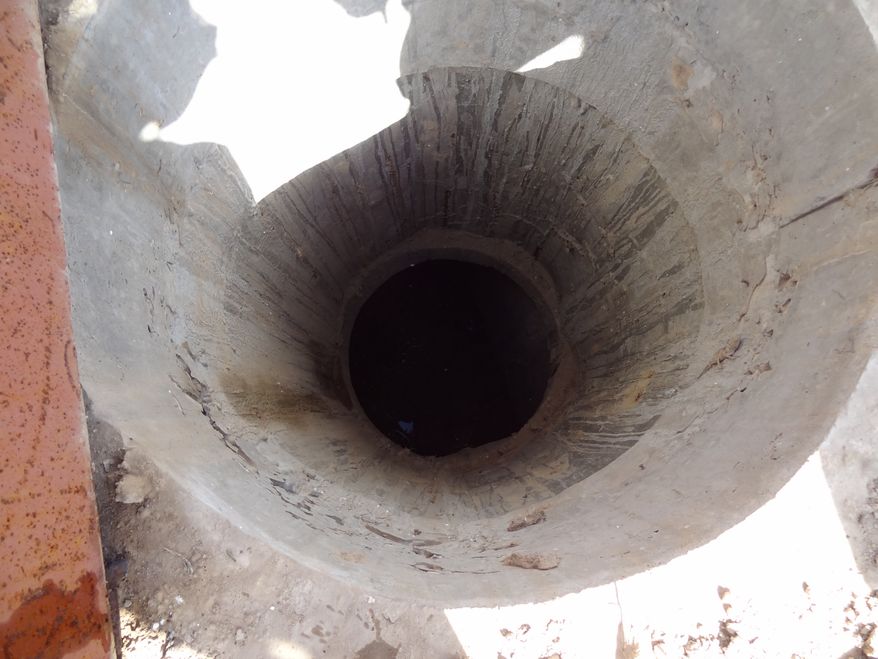 Access point to septic tank at the Balkh Education Facility in Afghanistan.
In the latest aid problem in Afghanistan, investigators found that a school built for the Balkh province is still unfinished, with structural issues that could pose a danger to students and teachers.
“Nearly 5 years after construction began, the U.S. Agency for International Development (USAID) is unable to transfer the facility to Afghan authorities,†said the Special Inspector General for Afghanistan Reconstruction.
The school needs repairs to “a leaking roof, defective electrical wiring, and an improperly sloped terrace roof,†inspectors said, adding that sewer pipes near water sources aren't properly insulated, raising the possibility of contamination.
They're also concerned about whether the roof and septic system are designed to hold the weight imposed on them, and that officials cannot assure that the structure “will not collapse at some point in time.â€
USAID disagreed that the building is structurally unsound. The Army Corps of Engineers which built the school, has “rigorous procedures and requirements for the design and construction of its building projects.â€
The aid agency did agree that work on the school is incomplete, and said they will fix any remaining problems with the building.
The school has yet to be approved for use, but classes were held in the building in 2013. In response, USAID secured the facility to make sure no one used it, but SIGAR noted that Afghan authorities are not pleased about the ongoing delays.
The original contract to build the school was just under $3 million, part of a $17.1 million program to build a system of educational facilities across Afghanistan.