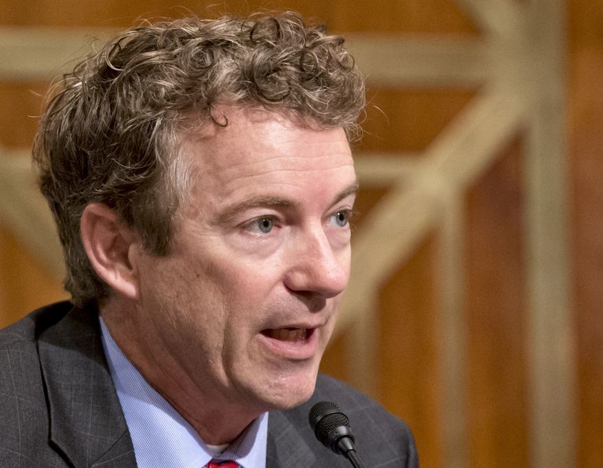 FILE - In this Nov. 6, 2013 file photo, Sen. Rand Paul, R-Ky. speaks on Capitol Hill in Washington. This is a year of auditioning, positioning, networking and just plain hard work for people who are considering running for president in 2016. You could see them stirring in 2013 as they plugged holes in resumes, took preliminary steps to build potential campaign organizations and made carefully calibrated moves to get better known by Americans generally and key constituencies in particular. Most _ but not all _ are ticking off items on what could be called the presidential prep checklist. And they’ve got baggage to deal with. (AP Photo/J. Scott Applewhite, File)