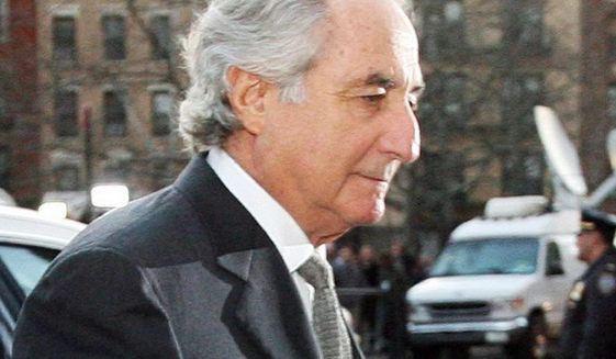Bernard Madoff is serving a 150-year prison term for his Ponzi scheme that stole an estimated $36 billion from investors. (Associated Press) **FILE**