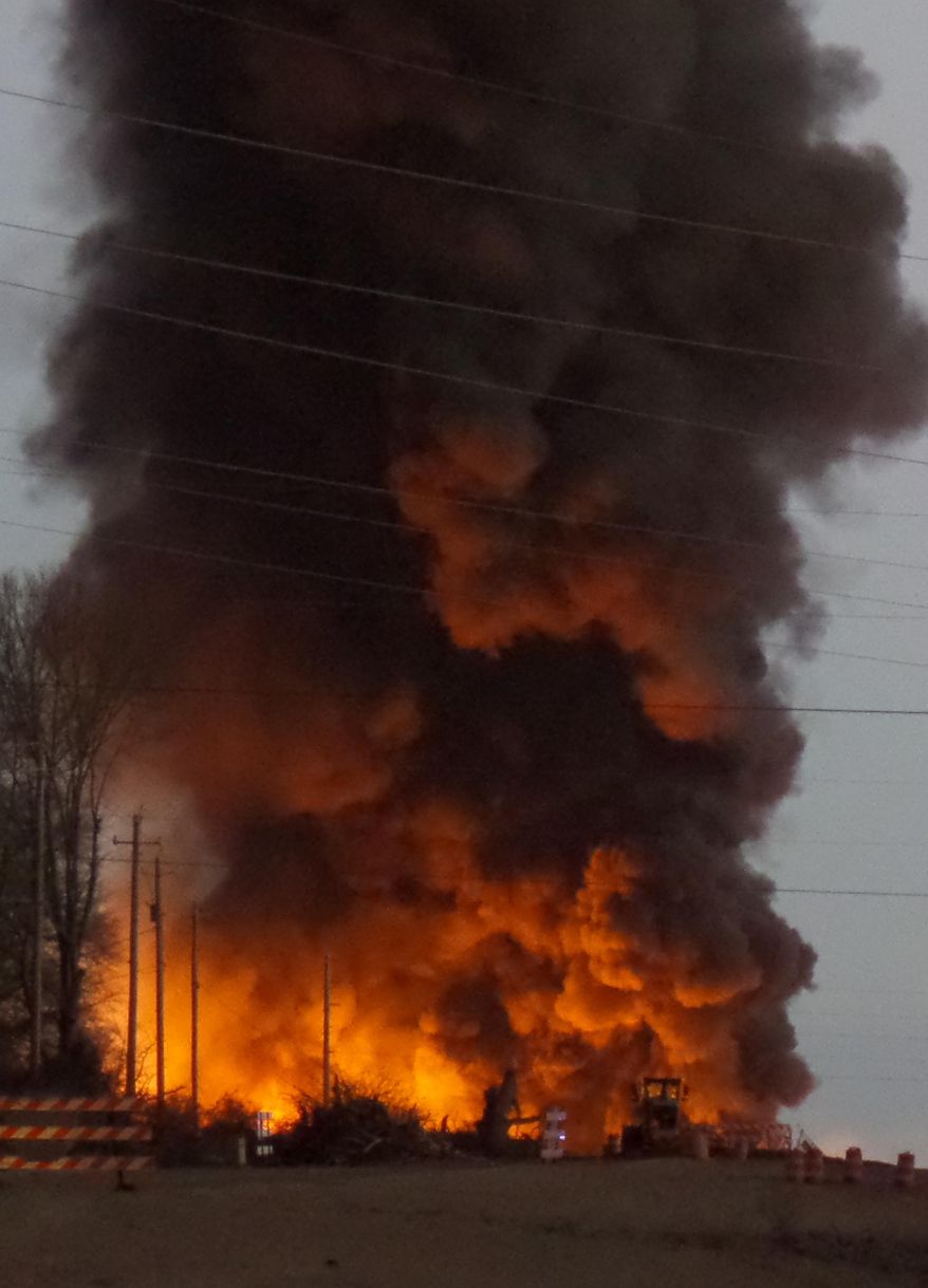 A fire at a biodiesel facility near New Albany, Miss., burns early Wednesday, Jan. 22, 2014. The fire was so hot that firefighters could not get close enough to fight it, the Mississippi Highway Patrol said. The plant is located near New Albany on Mississippi Highway 15, which has been closed to traffic. Firefighters are letting it burn out. (AP Photo/The New Albany Gazette, Angie Barmer) MANDATORY CREDIT