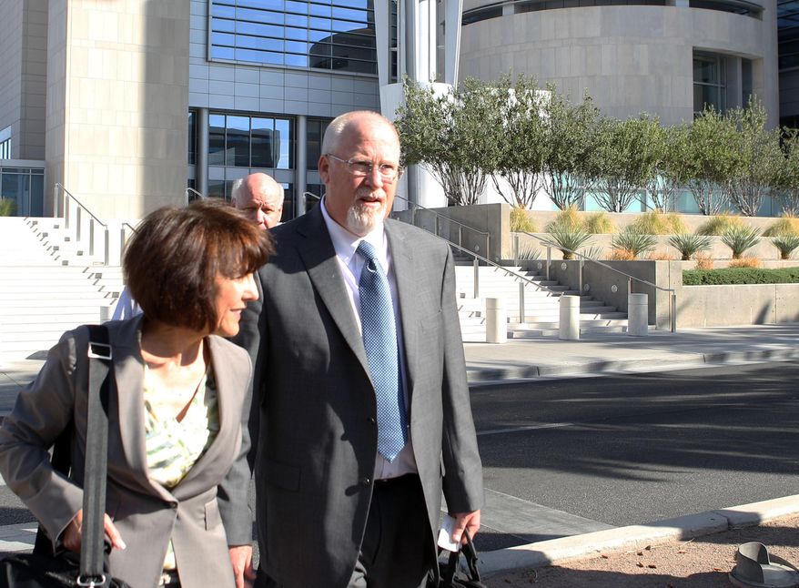 File-This April 3, 2013 file photo shows one-time political powerbroker Harvey Whittemore leaving the Lloyd George Federal Courthouse in Las Vegas. A Nevada State Bar panel has 30 days to recommend whether lawyer, developer and former political powerbroker, Whittemore should keep his law license or be suspended or disbarred. Disciplinary hearings ended Wednesday Jan. 22, 2014 in Reno, and it'll be up to the Nevada Supreme Court to take the State Bar recommendation and make a final decision on Whittemore's future. (AP Photo//Las Vegas Review-Journal, Jerry Henkel,File)