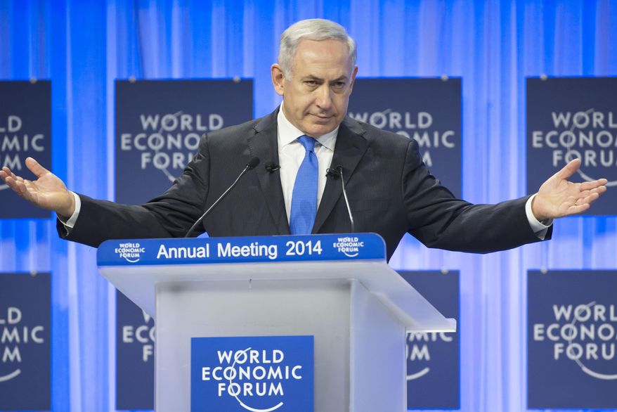 Israeli Prime Minister Benjamin Netanyahu gestures as he speaks during a session at the World Economic Forum in Davos, Switzerland, Thursday, Jan. 23, 2014. Leaders gathered in the Swiss ski resort of Davos have made it a top priority to push to reshape the global economy and cut global warming by shifting to cleaner energy sources. (AP Photo/Michel Euler)