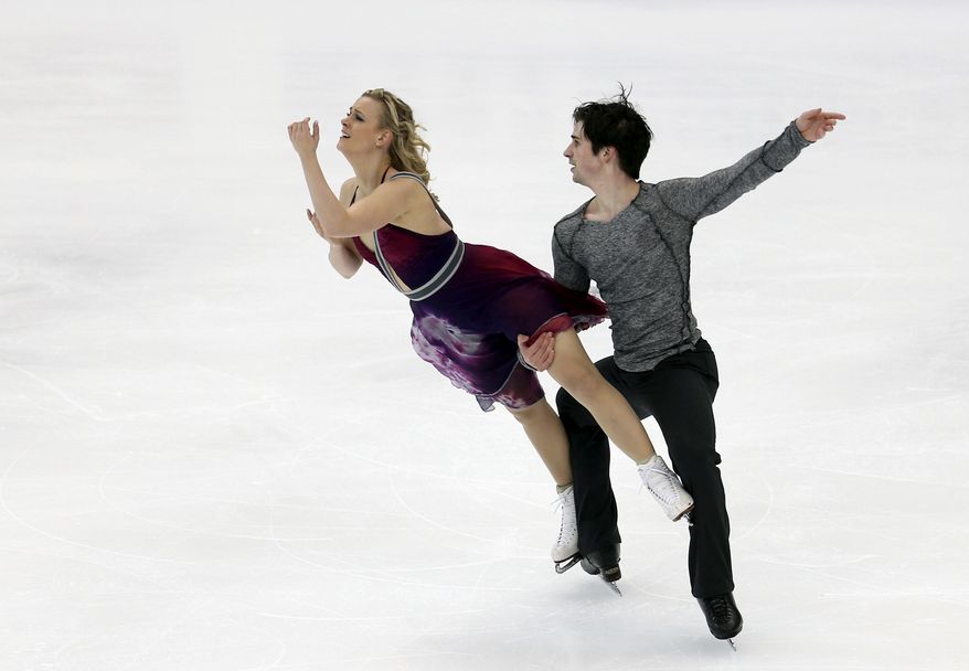 United States&#x27; Madison Hubbell and Zachary Donohue perform during the ice dance free dance at the Four Continents figure skating championships  in Taipei, Taiwan, Thursday, Jan. 23, 2014. (AP Photo/Chiang Ying-ying)