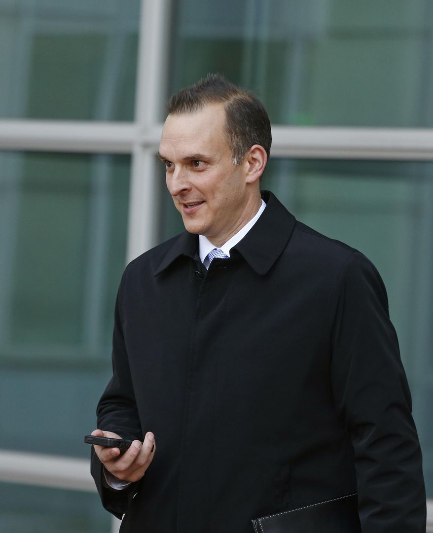 U.S. Anti-Doping Agency (USADA) CEO Travis Tygart leaves a federal courthouse following the sentencing of a man who sent Tygart a threatening email, in Denver, Thursday Jan. 23, 2014. A judged on Thursday ordered Gerrit Keats, of Clearwater, Fla., to serve three years' probation and complete 540 hours of community service for threatening Tygart after the USADA stripped Lance Armstrong of his Tour de France titles. (AP Photo/Brennan Linsley)