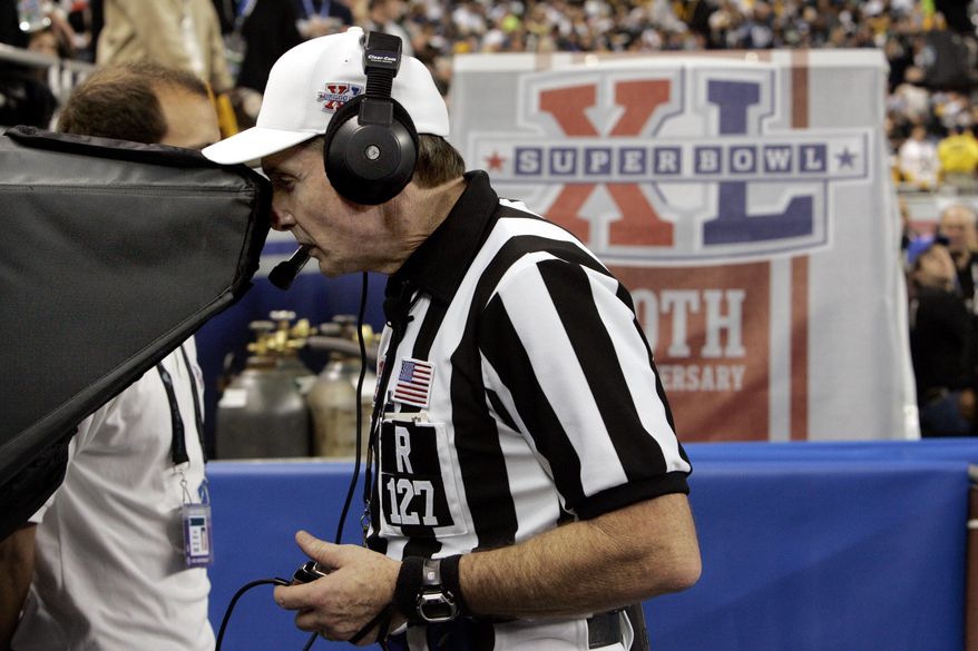 ADVANCE FOR WEEKEND EDITIONS, JAN. 25-26 - In this Feb. 5, 2006, file photo, feferee Bill Leavy reviews the play after Pittsburgh Steelers quarterback Ben Roethlisberger's 1-yard dive was called a touchdown during the second quarter of play against the Seattle Seahawks at the Super Bowl XL football game in Detroit. The call stood as a touchdown. Seattle's basketball team now plays in Oklahoma. The once proud baseball franchise hasn't been to the playoffs in more than a decade. And don't even mention the Super Bowl loss to Pittsburgh. The name "Bill Leavy" might as well be an expletive in these parts. (AP Photo/Paul Sancya, File)