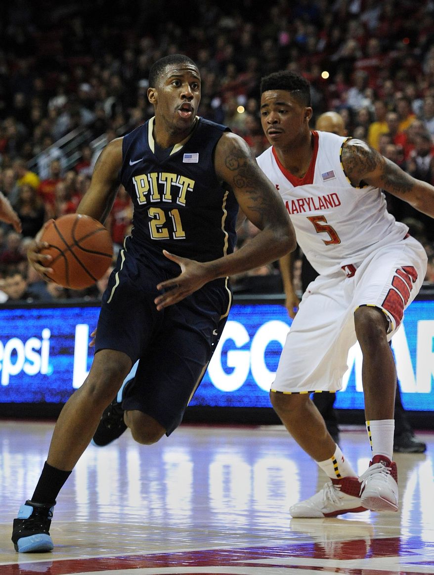 Pittsburgh's Lamar Patterson, left, drives the ball to the basket and past Maryland's Nick Faust in the second half of an NCAA college basketball game Saturday, Jan. 25, 2014, in College Park, Md. Pittsburgh won 83-79. (AP Photo/Gail Burton)