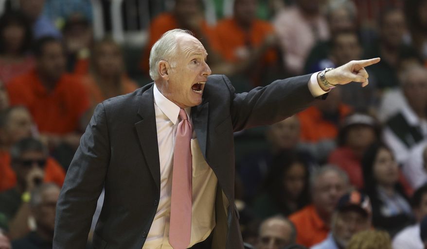 Miami coach Jim Larranaga shouts during the second half of a NCAA college basketball game against Syracuse in Coral Gables, Fla., Saturday, Jan. 25, 2014. (AP Photo/J Pat Carter)