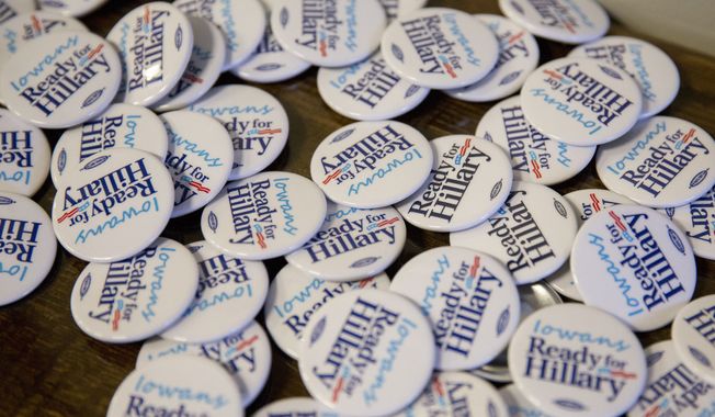Campaign buttons are ready for distribution at an Iowa kickoff event for the national Ready for Hillary group led by Craig Smith, senior adviser to the Ready for Hillary group, in Des Moines, Iowa, Saturday, Jan. 25, 2014. Ready for Hillary is a so-called super PAC building a national network to benefit Clinton if she decides to seek the presidency in 2016. The gathering of Iowa Democrats including the state chairs of both Clinton and President Barack Obama&#x27;s 2008 campaigns. (AP Photo/Justin Hayworth)